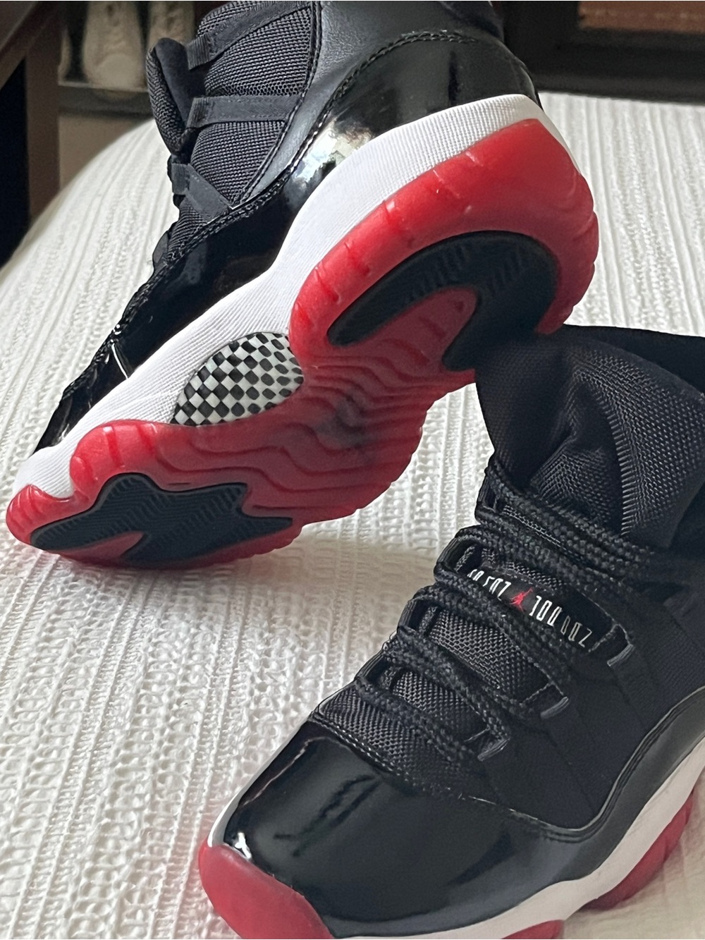 Nike Air Jordan 11 Retro Bred High-Top Size 7 Youth Black and Red Sneakers
